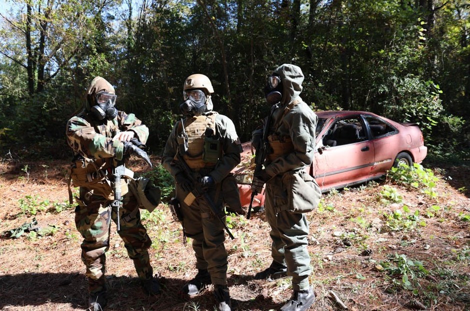 RDAX Dragon Spear participants model CBRN protective suits, the warfighter on the left wears the currently fielded joint service lightweight integrated suit while the two warfighters on the right wear the new UIPE FOS GP suit. Photo: Alex Hillman, JPEO-CBRND Public Affairs.