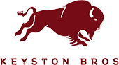 Maroon silhouette of a leaping buffalo above the text "KEYSTON BROS" in matching maroon.