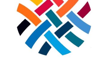 Colorful woven design in a circular pattern, featuring shades of blue, red, yellow, and black, with "STRC" below.