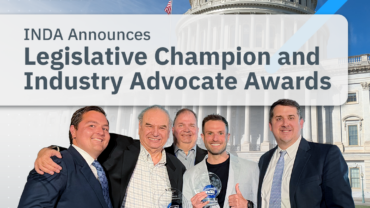 Five men stand in front of the U.S. Capitol, holding awards, celebrating the INDA Legislative Champion and Industry Advocate Awards.