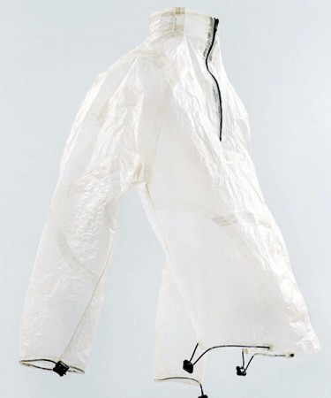 White, lightweight jacket displayed against a minimalist background, featuring a zippered front and adjustable cords at the hem and sleeves.