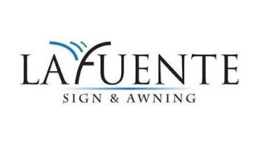 Logo featuring the text "LA FUENTE" in bold black with a blue wave element and smaller text "SIGN & AWNING" below.